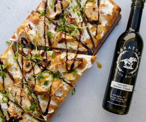 Honey Mustard Chicken and Lavender Flatbread next to bottle of lavender balsamic vinegar